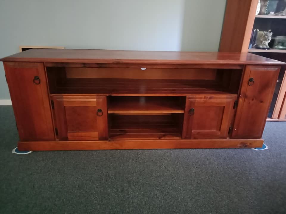 BEFORE my tv unit was the old red stain and i wanted to brighten my house